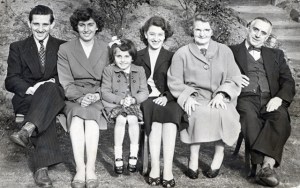 Father Christmas pictured with his family! From left to right, son Graham and his wife Winnie (neé Jukes) and daughter Margaret, a family friend, wife Sarah (neé Gough) and Edward himself.