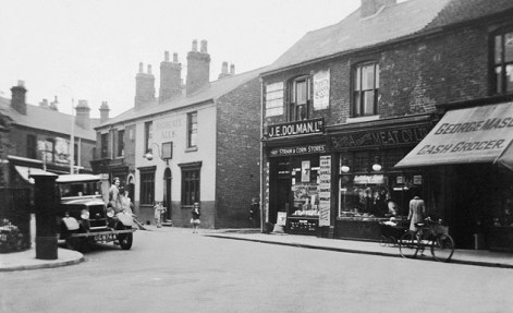 The premises of J .E. Dolman Ltd,. with the Bakers Inn next to the gulley that ran round to Careless Street.