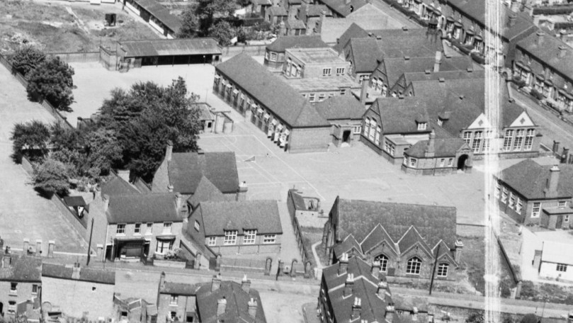A view of the Senior school in 1950. The church building in the right foreground is not part of the school.